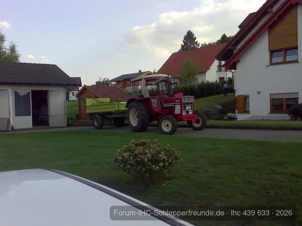 644 mit Fliegl 3-Seitenkipper